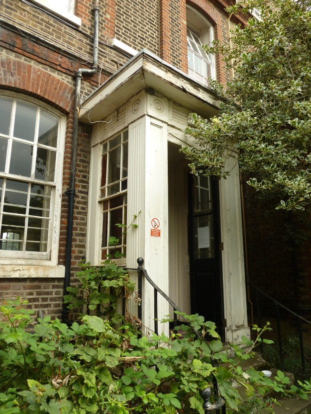 Victorian Porch on rear entrance to the building