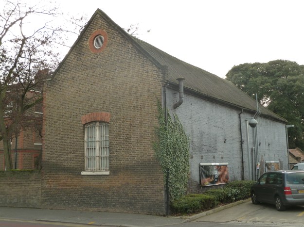 The rear of the stables block, facing the Esso Petrol Station on Hoe Street
