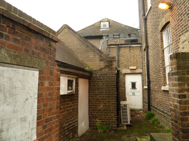 The grouping of outbuildings to the rear of the stables block